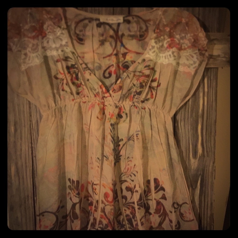 Shear blouse with lace.